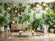 Modern living room with eco-friendly botanical wallpaper, potted plants, and natural wood furniture in a serene, sustainable decor setting.