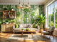 Modern living room with sustainable green botanical wallpaper, natural wood furniture, and indoor plants.